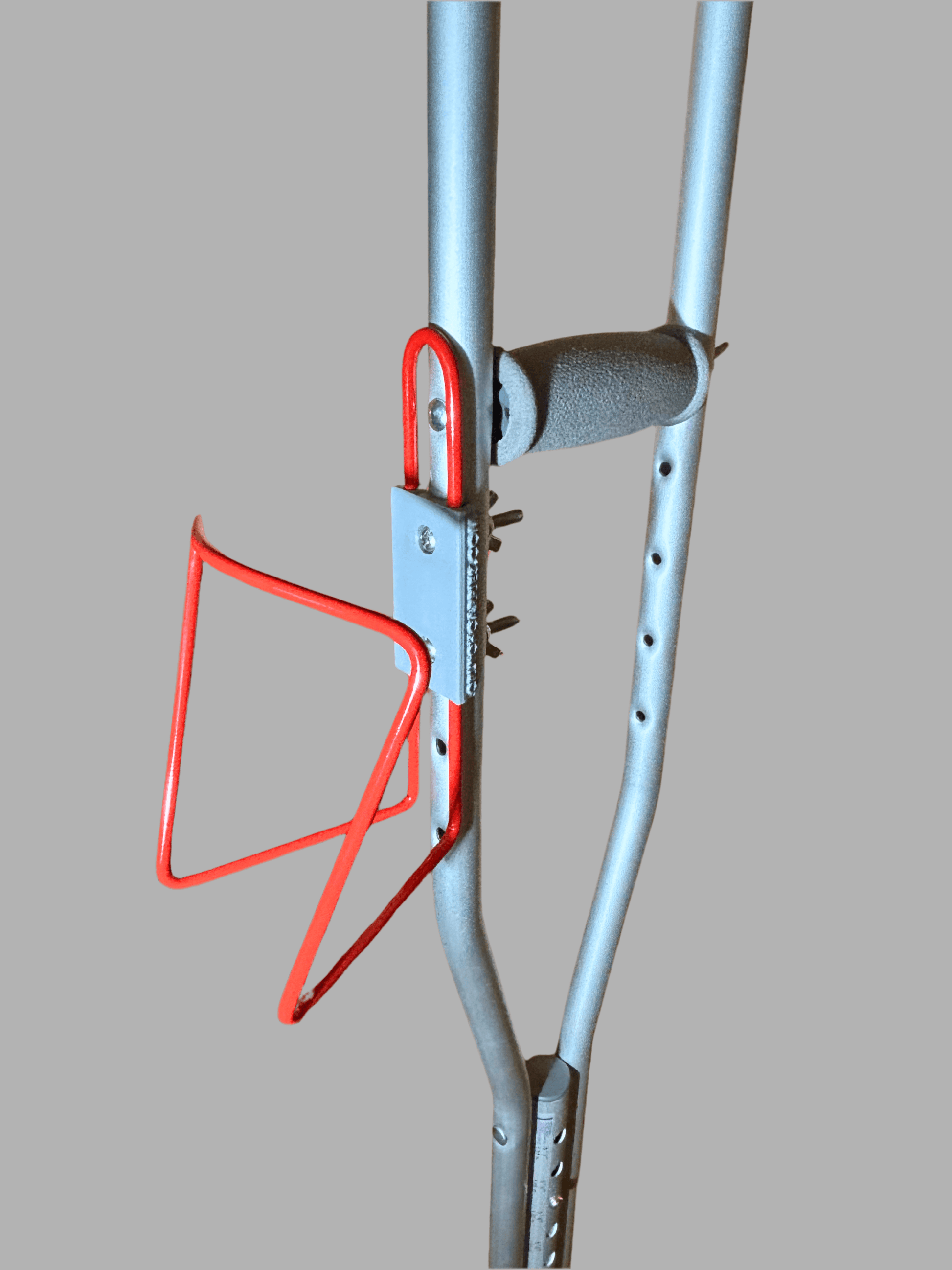 Durable crutch cup holder in aluminum, designed to bolt onto crutches and hold drink containers securely.