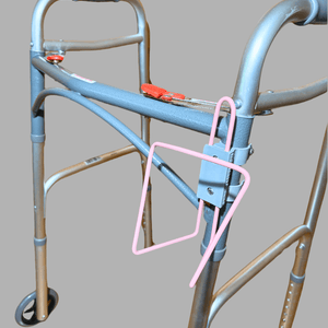 Durable aluminum walker with cup holder attachment for hands-free hydration on the go.