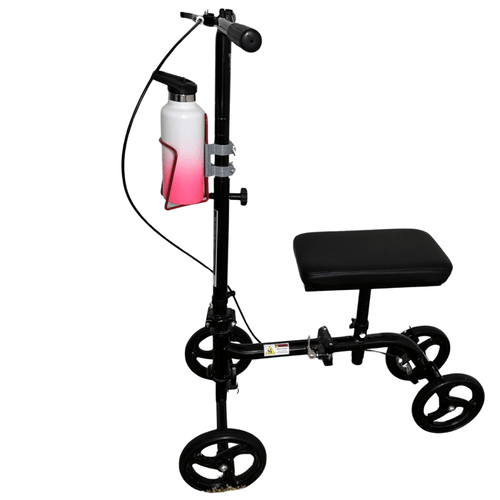 aluminum drink holder attached to knee scooter with white and pink tumbler attached.