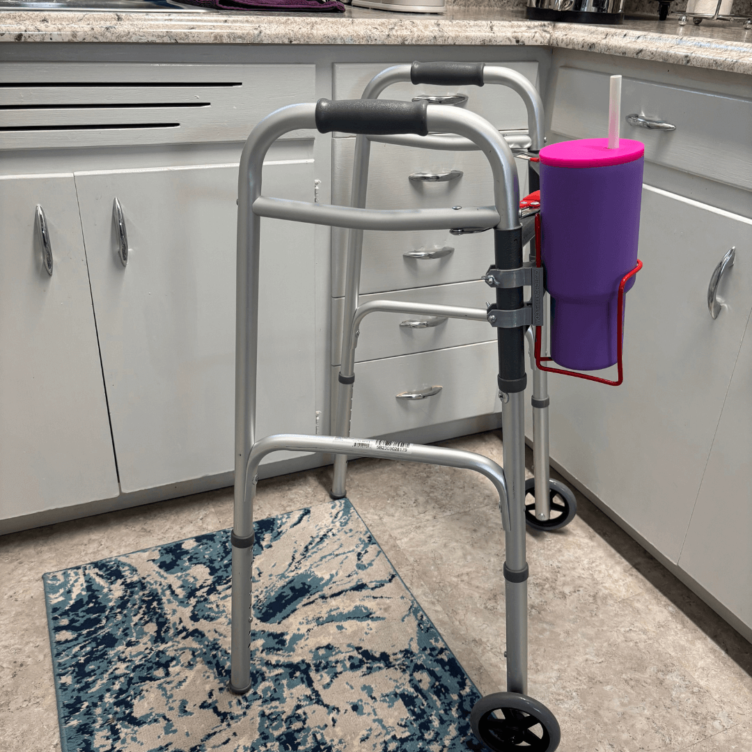 Translation missing: en.walker cup holder aluminum drink holder for walkers attached to a walker in a kitchen setting