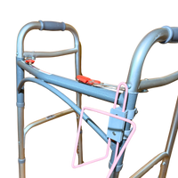 Walker Cup Holder in pink attached to a lightweight aluminum walker for hands-free hydration.