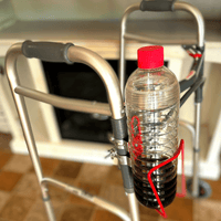 Walker with aluminum cup holder securely holding a water bottle, enhancing mobility and convenience for users.
